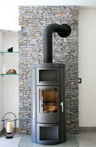 cordillera gray wandverbleder hinter dem kaminofen